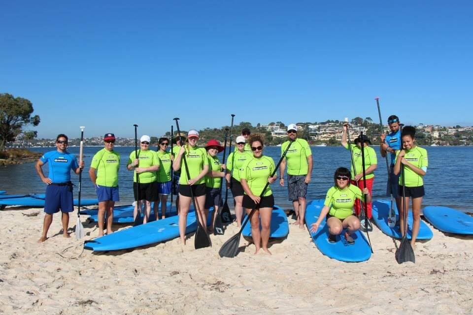 group with paddle boards